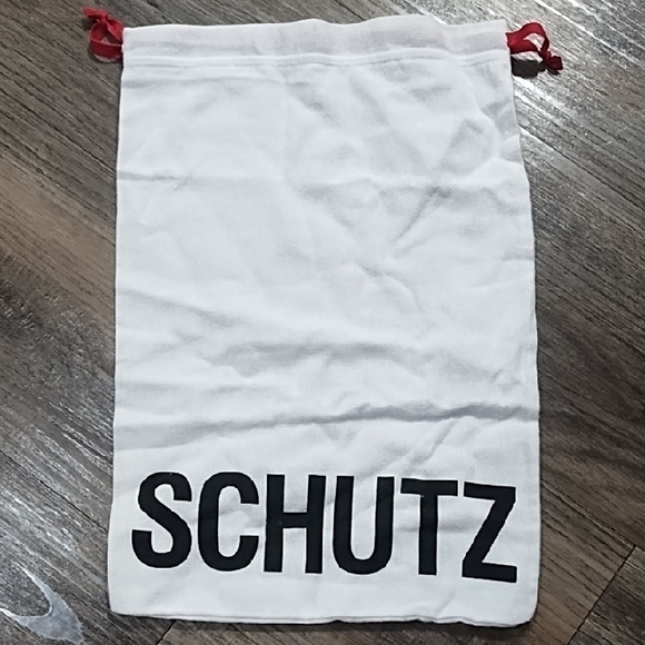 SCHUTZ Handbags - SCHUTZ White Bag with Black Logo and Red Accents